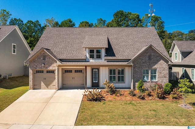 view of front facade with a front lawn and a garage