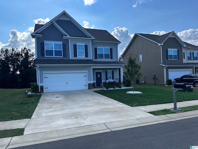 view of front facade featuring a front yard and a garage