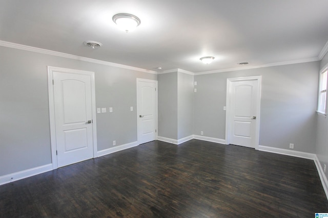 unfurnished room with dark hardwood / wood-style floors and crown molding