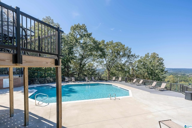 view of pool featuring a patio area