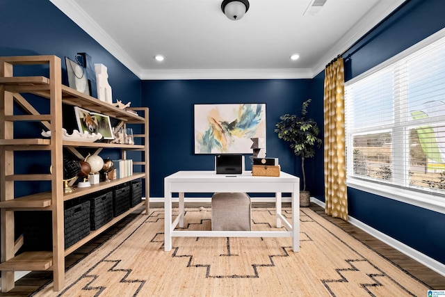 office space featuring hardwood / wood-style flooring, a wealth of natural light, and ornamental molding