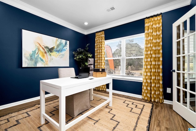 home office featuring hardwood / wood-style flooring and ornamental molding