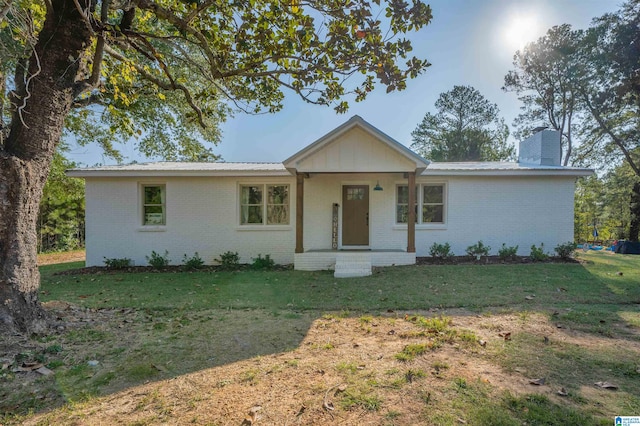 21023 Monroe Dunn Rd, Berry, AL 35546 - ranch-style house featuring a front lawn
