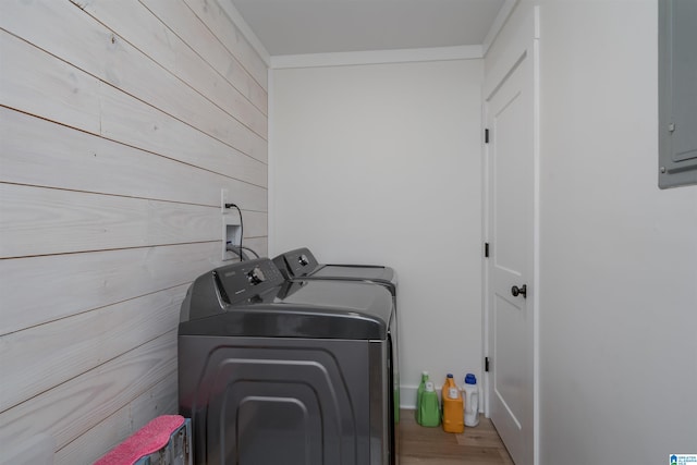 21023 Monroe Dunn Rd, Berry, AL 35546 - washroom featuring wood-type flooring, wooden walls, and washer and dryer
