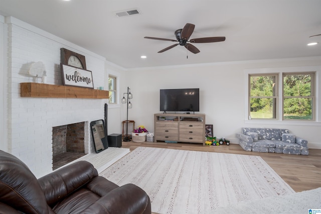 21023 Monroe Dunn Rd, Berry, AL 35546 - living room with hardwood / wood-style flooring, ceiling fan, plenty of natural light, and ornamental molding