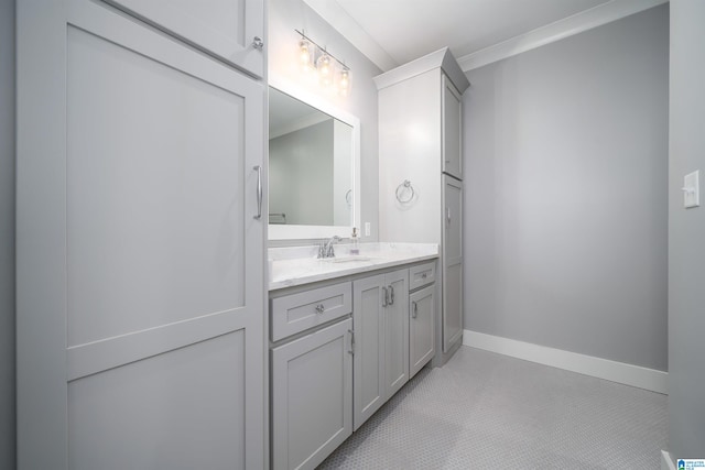 bathroom featuring crown molding and vanity