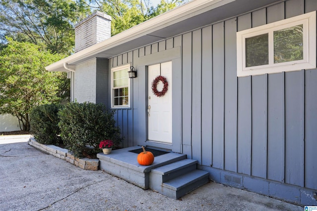 doorway to property with a patio