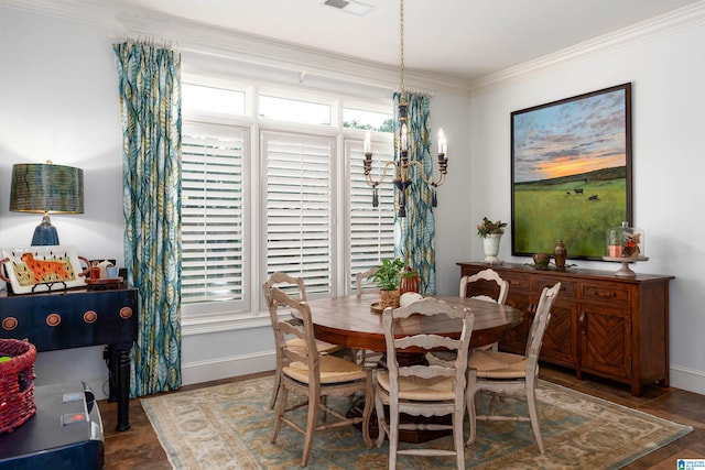 dining room with crown molding and dark hardwood / wood-style flooring