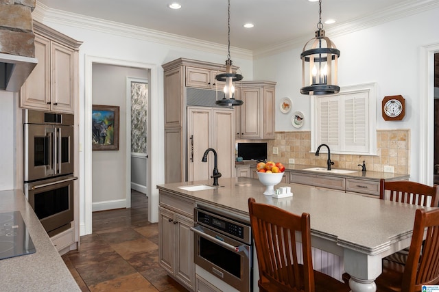 kitchen featuring pendant lighting, sink, backsplash, double oven, and crown molding