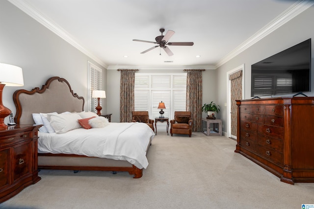 carpeted bedroom with crown molding and ceiling fan