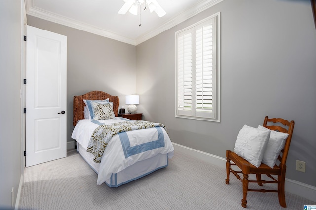 carpeted bedroom with ornamental molding, multiple windows, and ceiling fan