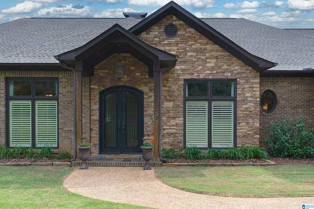 entrance to property with a yard