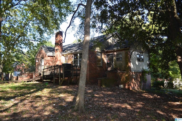 view of yard featuring a wooden deck