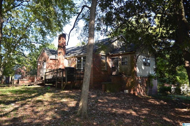 exterior space with a wooden deck