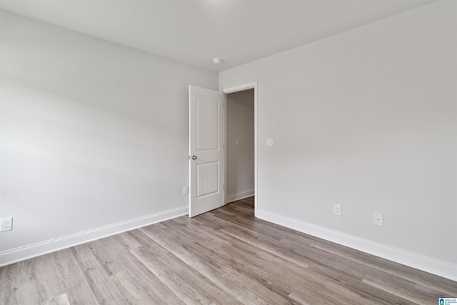 empty room featuring light hardwood / wood-style floors