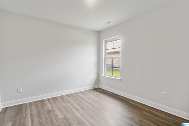 empty room with light wood-type flooring