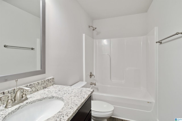 full bathroom with vanity, shower / bathtub combination, and toilet