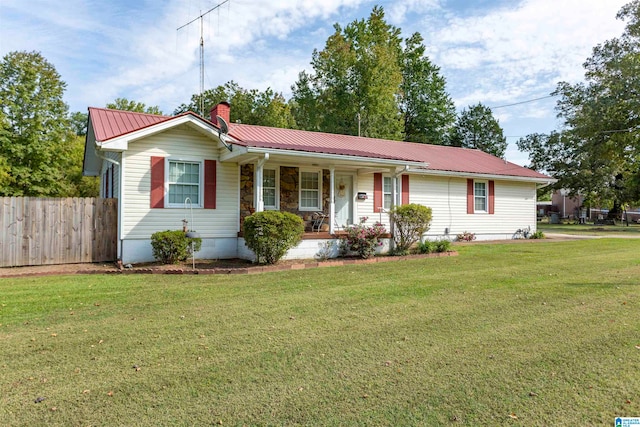 ranch-style home with a porch and a front yard