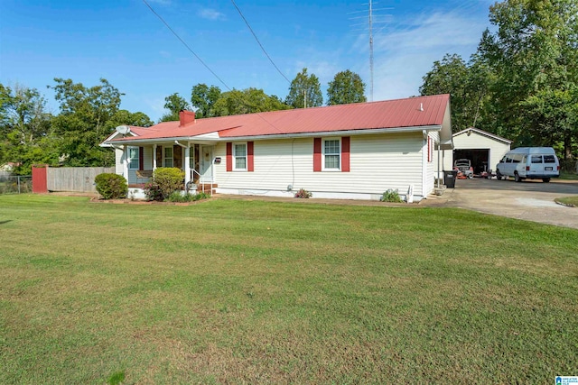 ranch-style home with a garage, a front lawn, and a carport