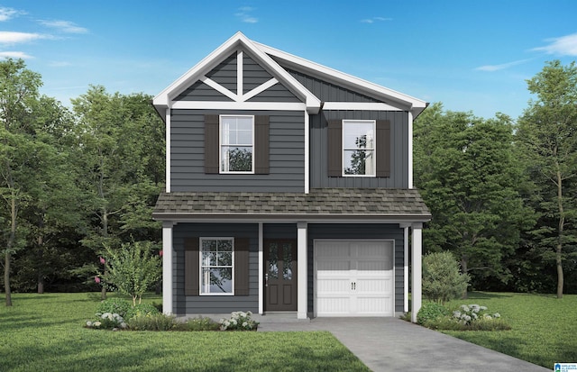 view of front of property featuring a front yard and a garage