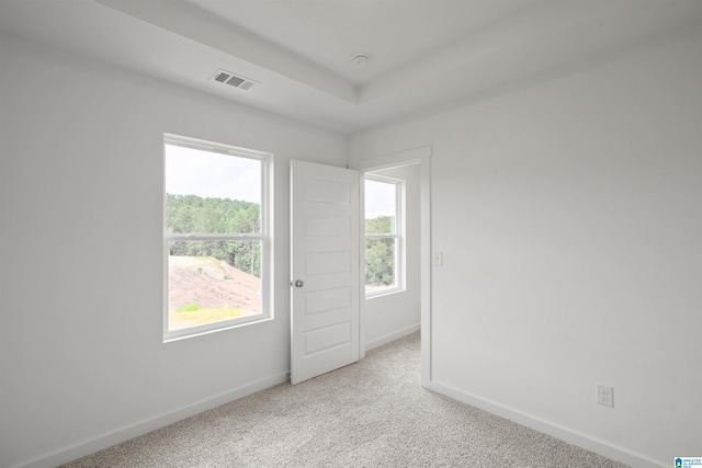 empty room featuring carpet flooring