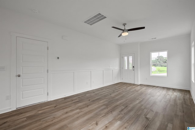 unfurnished room featuring ceiling fan and hardwood / wood-style floors