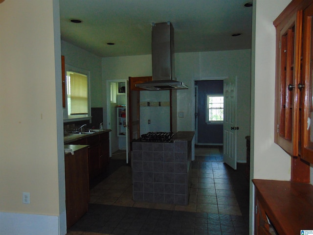 2820 20th St, Ensley, Birmingham, AL 35208 - kitchen with extractor fan, light tile patterned floors, a sink, and black gas cooktop
