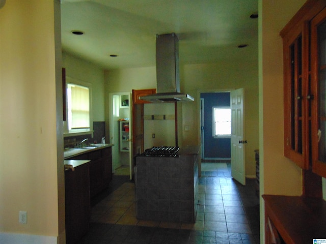 2820 20th St, Ensley, Birmingham, AL 35208 - kitchen featuring exhaust hood, gas stovetop, and tile patterned floors