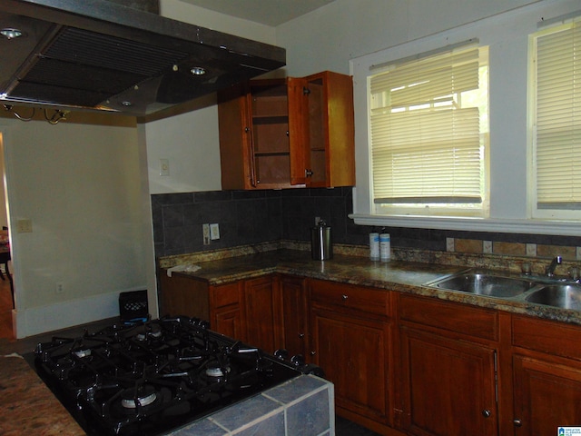 2820 20th St, Ensley, Birmingham, AL 35208 - kitchen featuring extractor fan, a sink, tasteful backsplash, range, and dark countertops