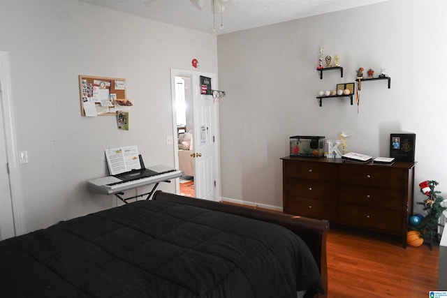 bedroom with wood-type flooring