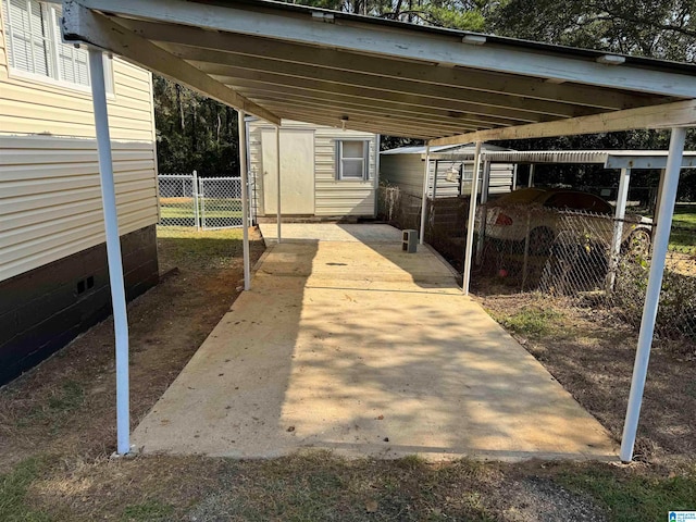 view of patio featuring a storage unit