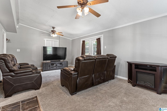 carpeted living room with lofted ceiling, ornamental molding, a textured ceiling, and ceiling fan