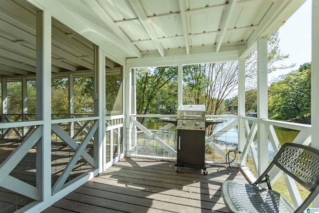 unfurnished sunroom with a wealth of natural light