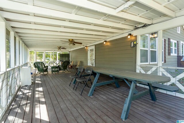 wooden terrace featuring ceiling fan