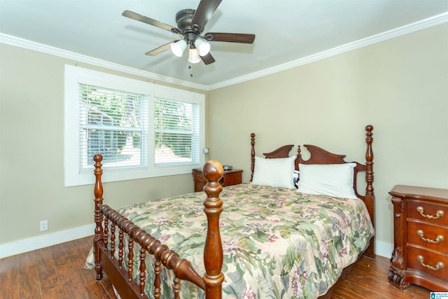 bedroom featuring ornamental molding, dark hardwood / wood-style floors, and ceiling fan