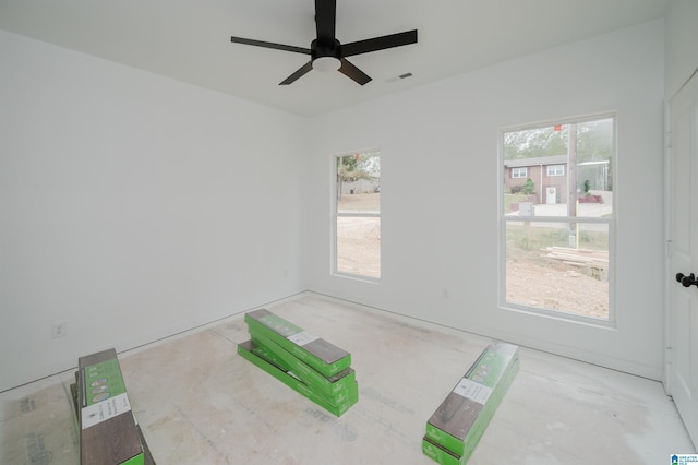 unfurnished room with ceiling fan