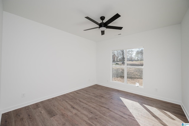 empty room featuring hardwood / wood-style flooring and ceiling fan