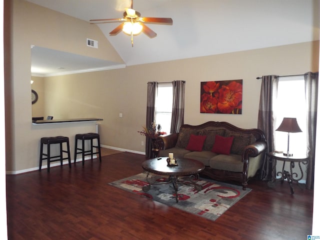 living room featuring dark wood-type flooring, ceiling fan, high vaulted ceiling, and ornamental molding