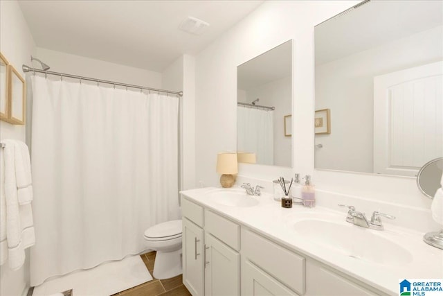 bathroom featuring hardwood / wood-style floors, vanity, walk in shower, and toilet