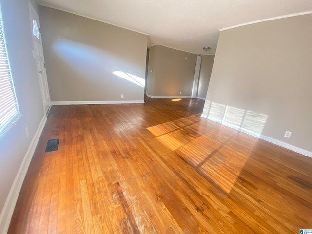 empty room featuring hardwood / wood-style floors