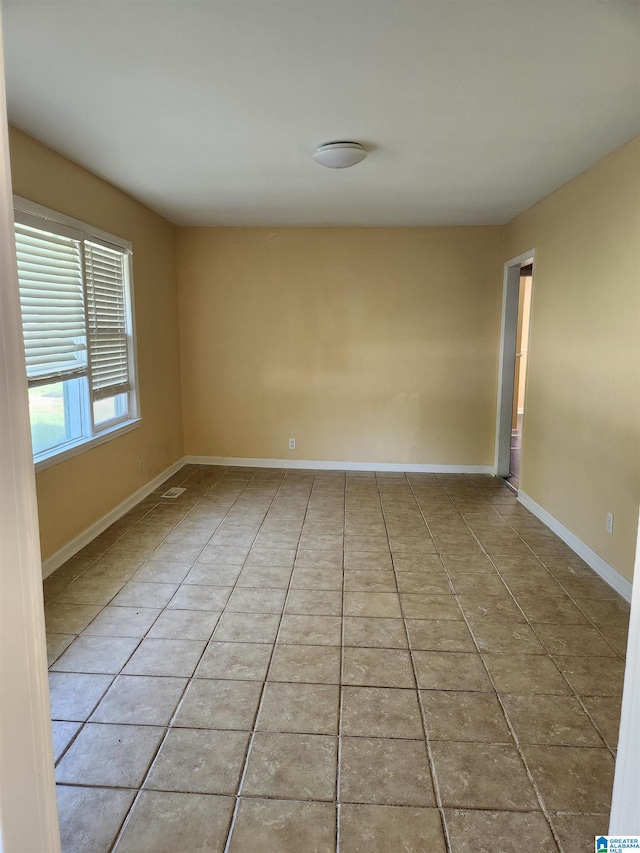 view of tiled spare room