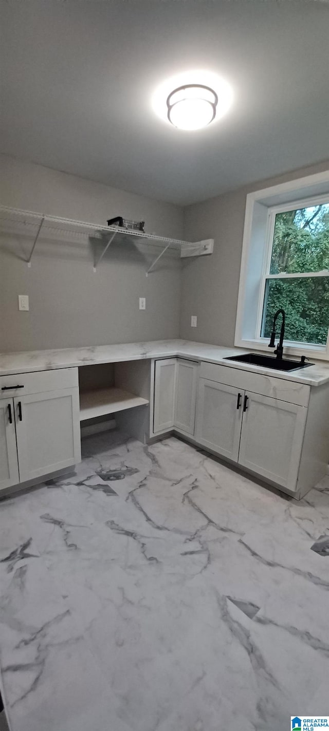 laundry area featuring sink