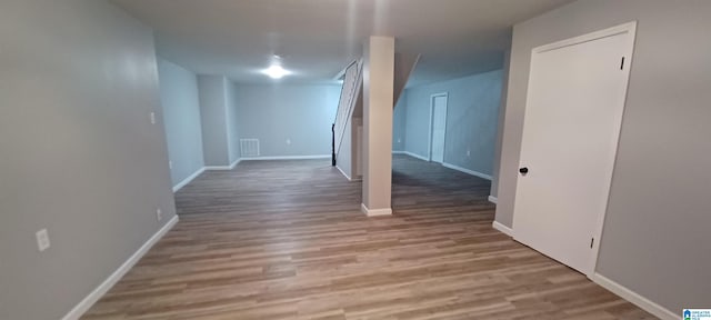 basement with light wood-type flooring