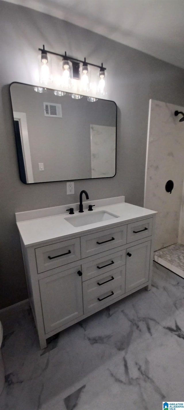 bathroom with vanity and walk in shower