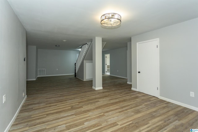 unfurnished living room featuring light hardwood / wood-style flooring