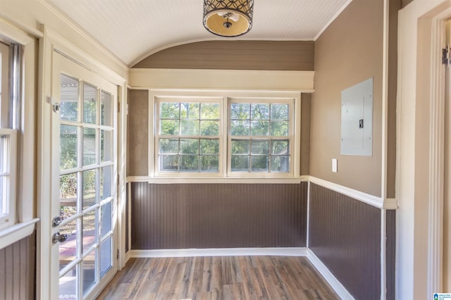 unfurnished sunroom with electric panel