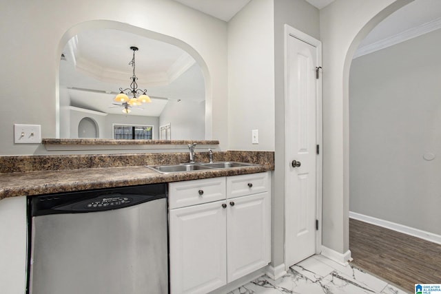 kitchen with an inviting chandelier, crown molding, sink, white cabinets, and stainless steel dishwasher