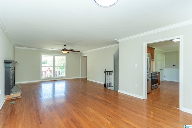 unfurnished living room featuring ceiling fan, crown molding, and light hardwood / wood-style floors