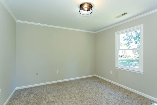 unfurnished room featuring light carpet and crown molding