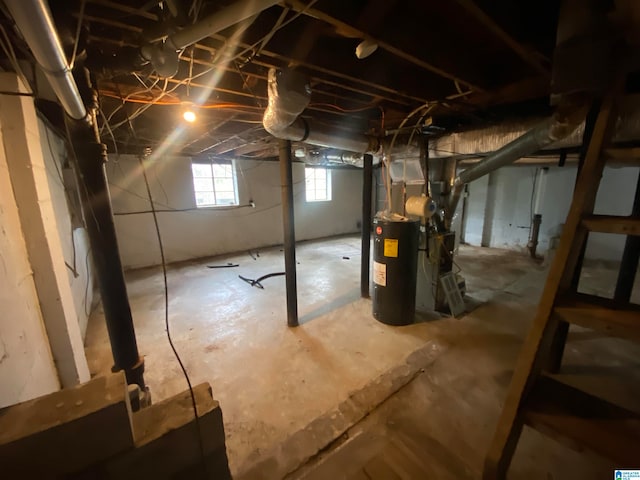 basement featuring electric water heater